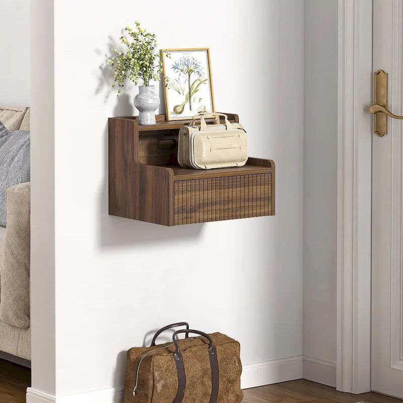 Modern floating bedside table with storage drawers and open shelves.